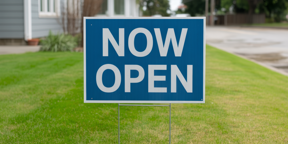 Where can I upload my own yard sign design and get free help fixing the layout if it looks off center?