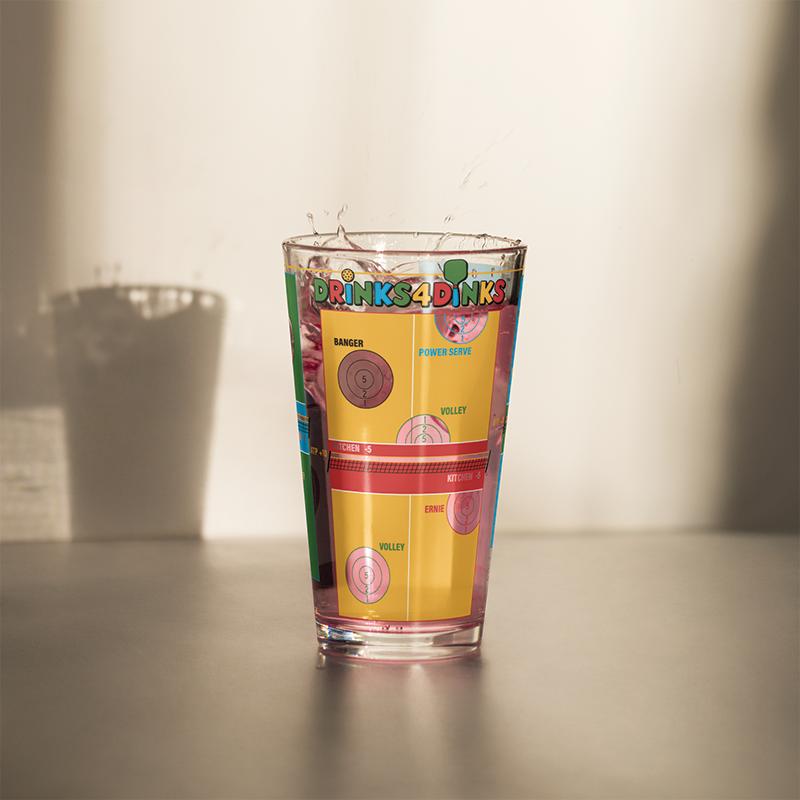Drinks4Dinks pint glass printed with a pickleball drinking game design