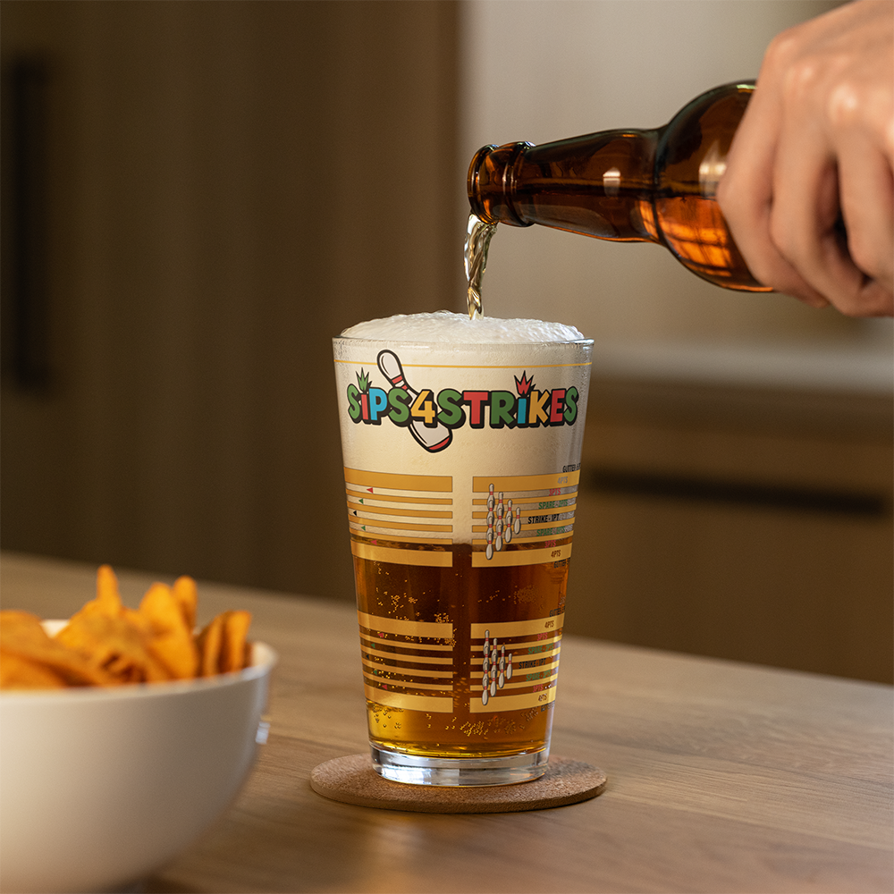 Sips4Strikes pint glass printed with four stacked bowling frames for a bowling drinking game